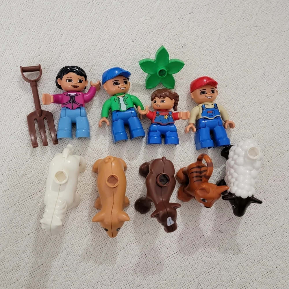 Lego Farmers set with 10 figures, including a farmer, farmer's wife, and 2 kids,